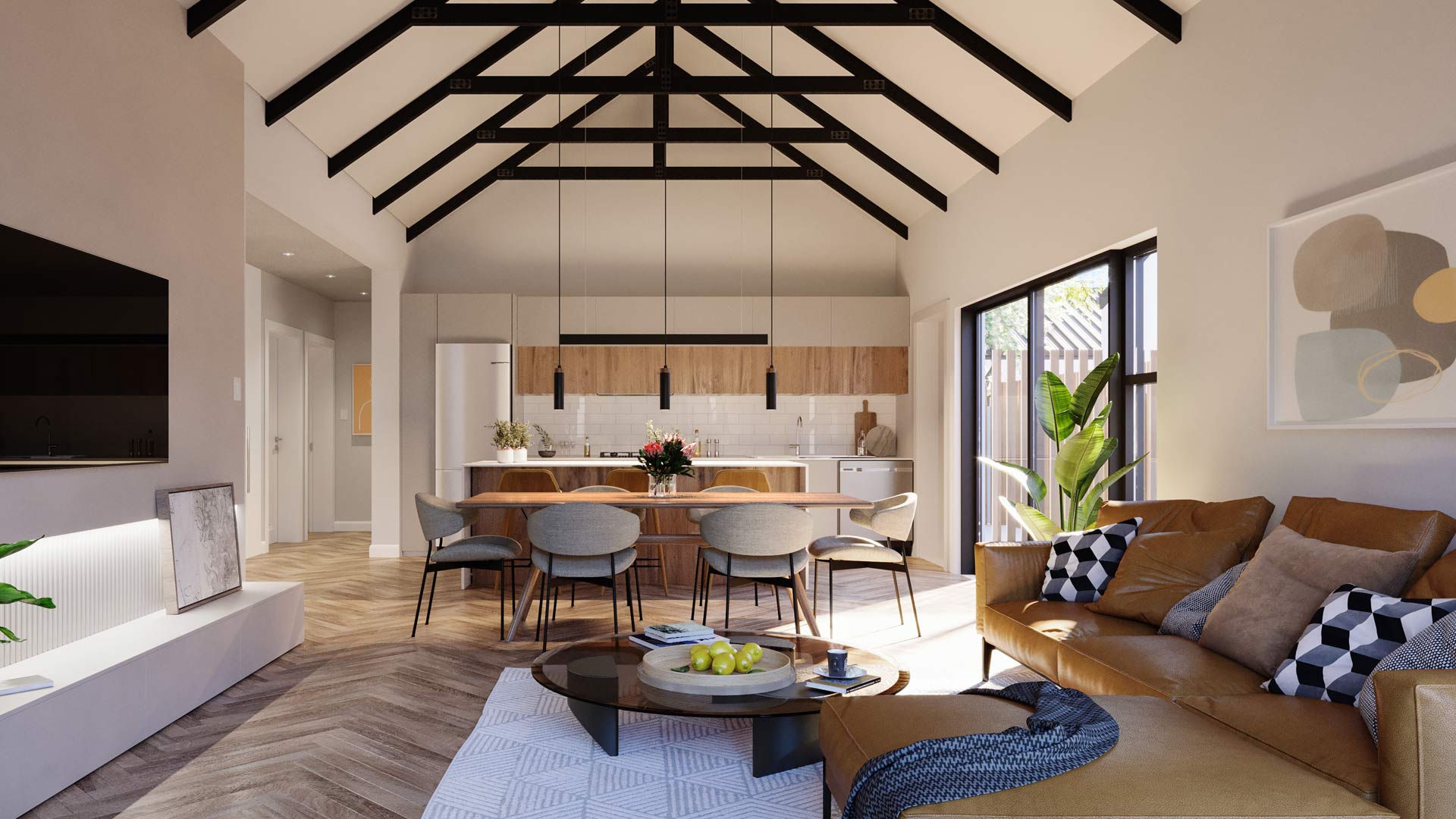 The spacious open-plan living area with a light-filled kitchen, dining room, and lounge